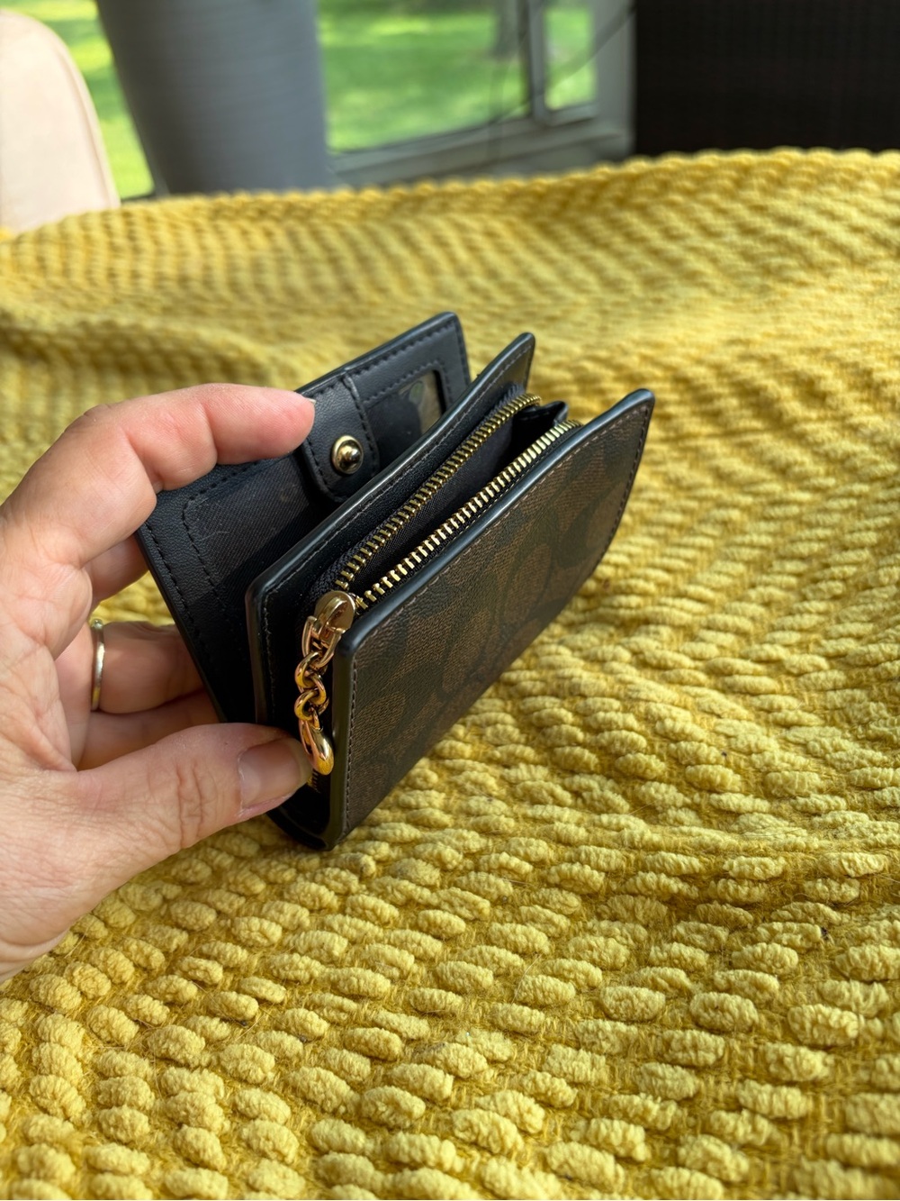 Woman’s Coach Black Leather Card Wallet with Gold Zip Accent